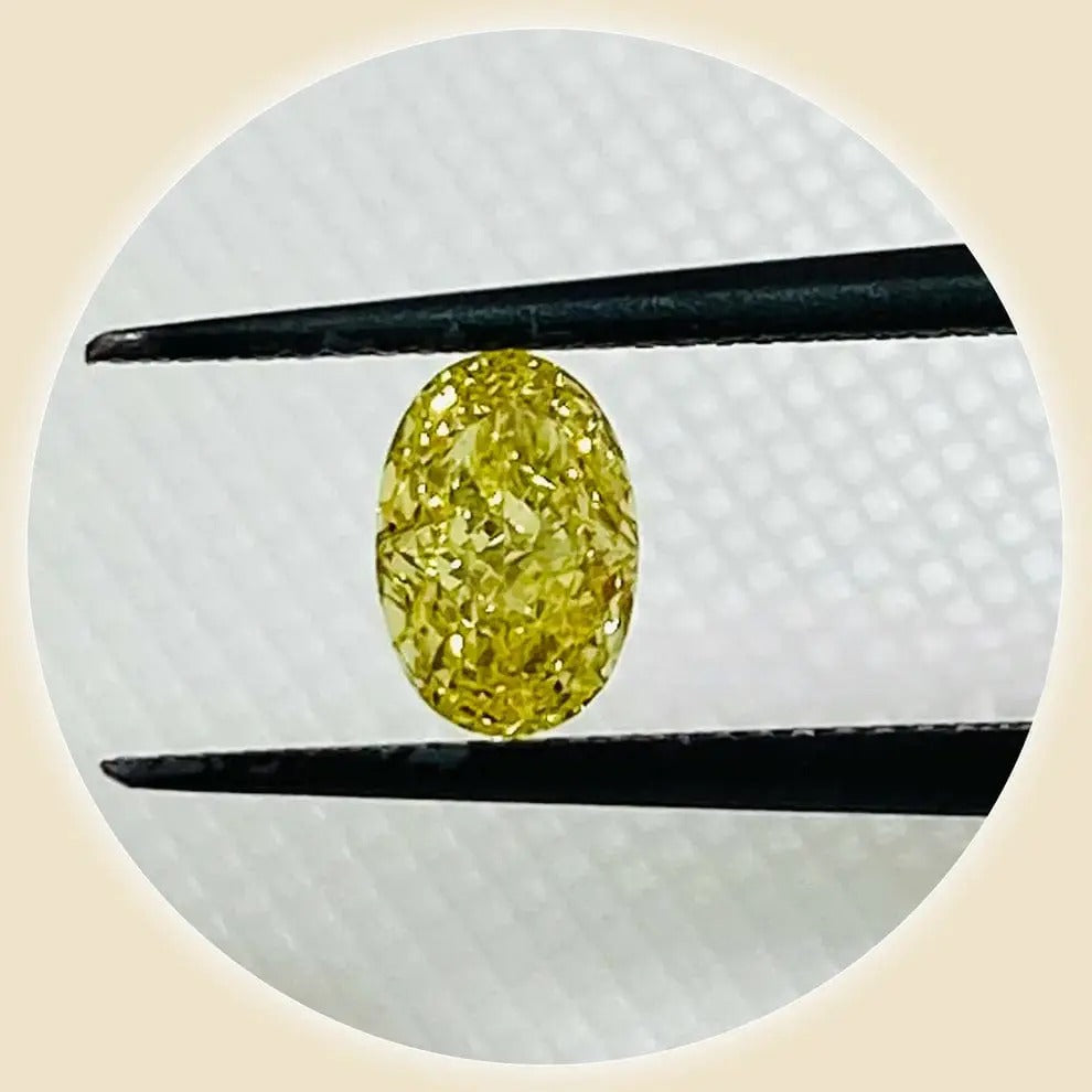 
                  
                    Diamond FANCY VIVID YELLOW 0.410 carats
                  
                